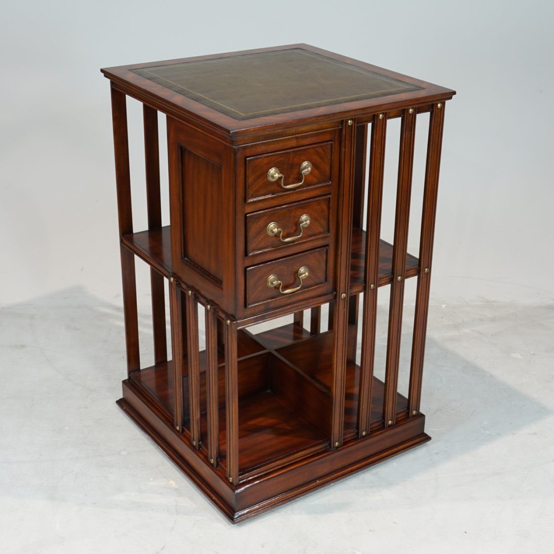 Revolving Traditional Handmade English Leather Top Bookcase