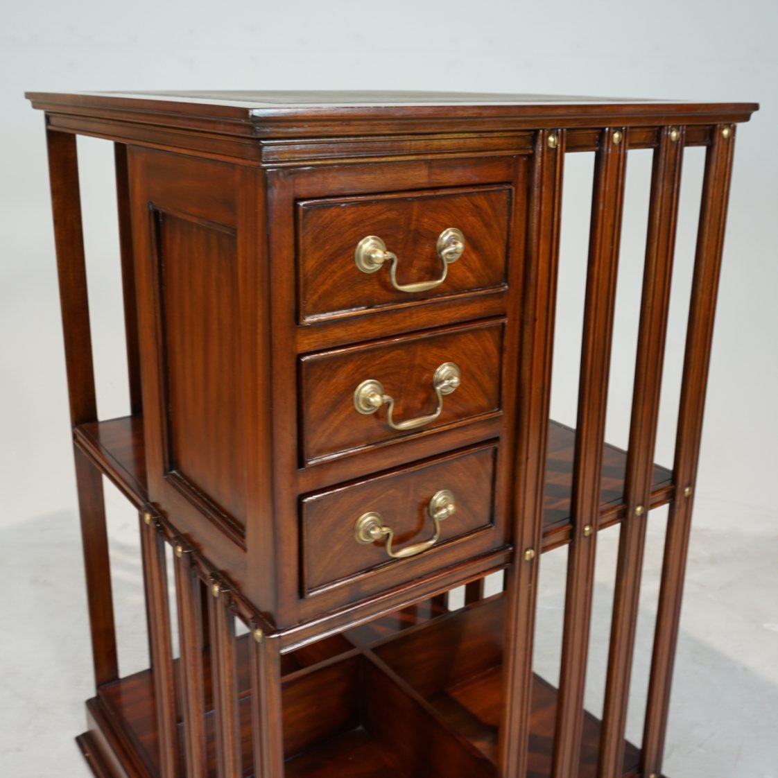 Revolving Traditional Handmade English Leather Top Bookcase