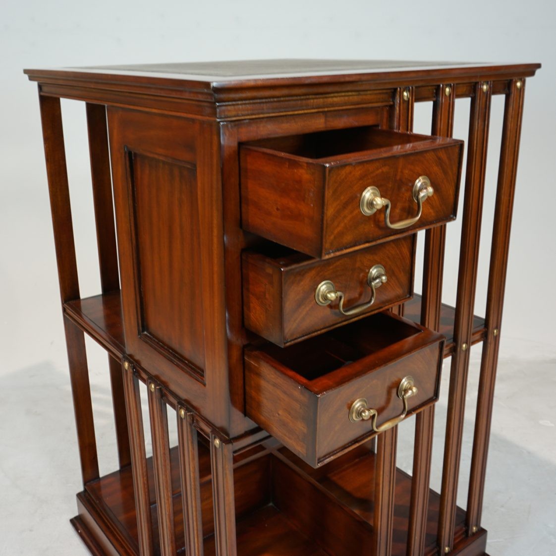 Revolving Traditional Handmade English Leather Top Bookcase